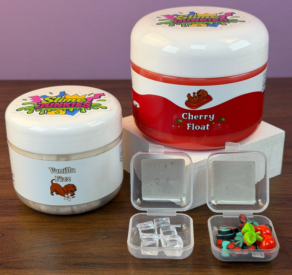 red coated clear slime with white cloud slime with cherry charm with fake cherry sprinkles and fake ice texture