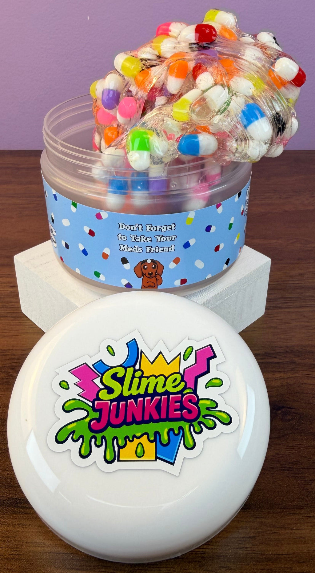 clear crunch bomb slime packed full with mini fake pills texture