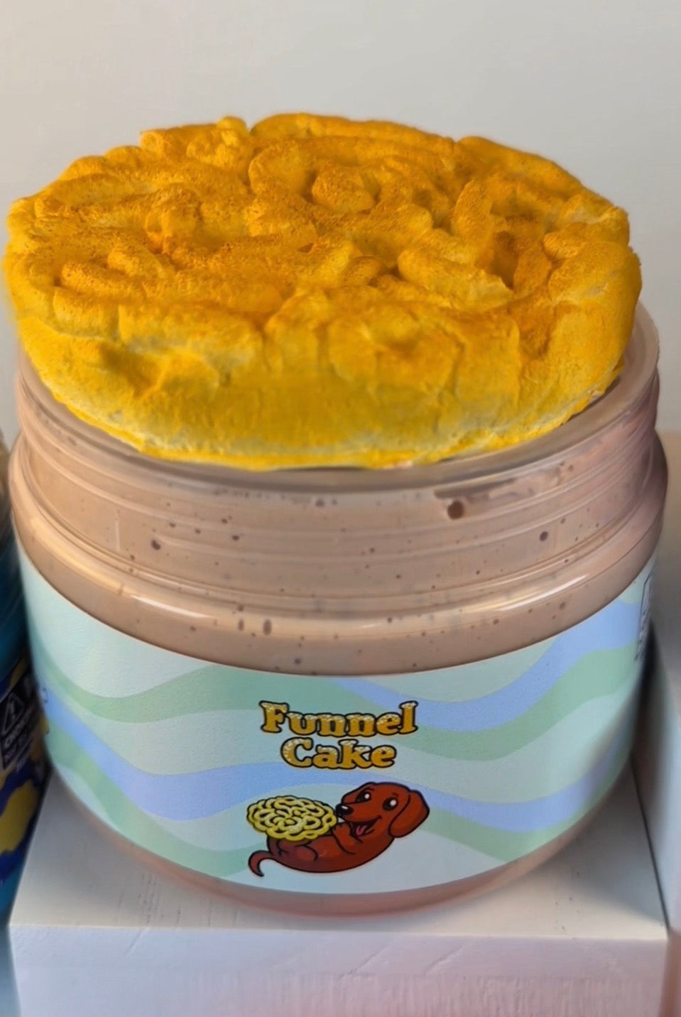 light tan ultra thick slime with clay topper with powder