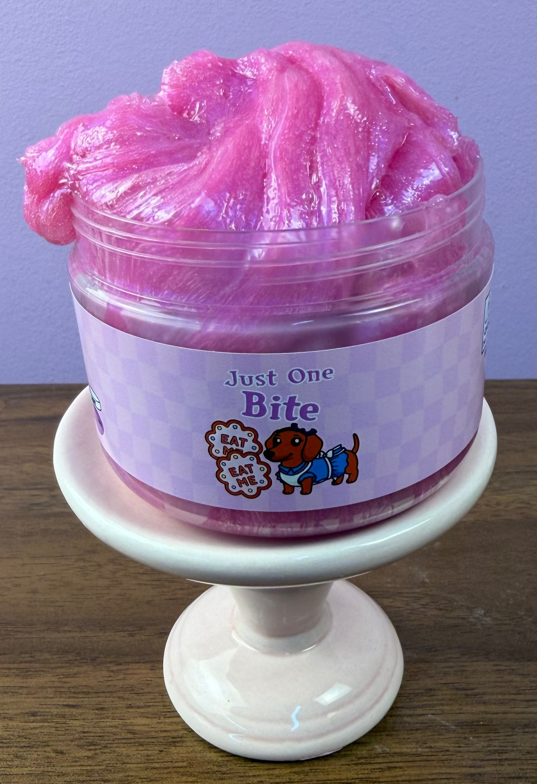 pink clear glue slime with purple shimmer texture