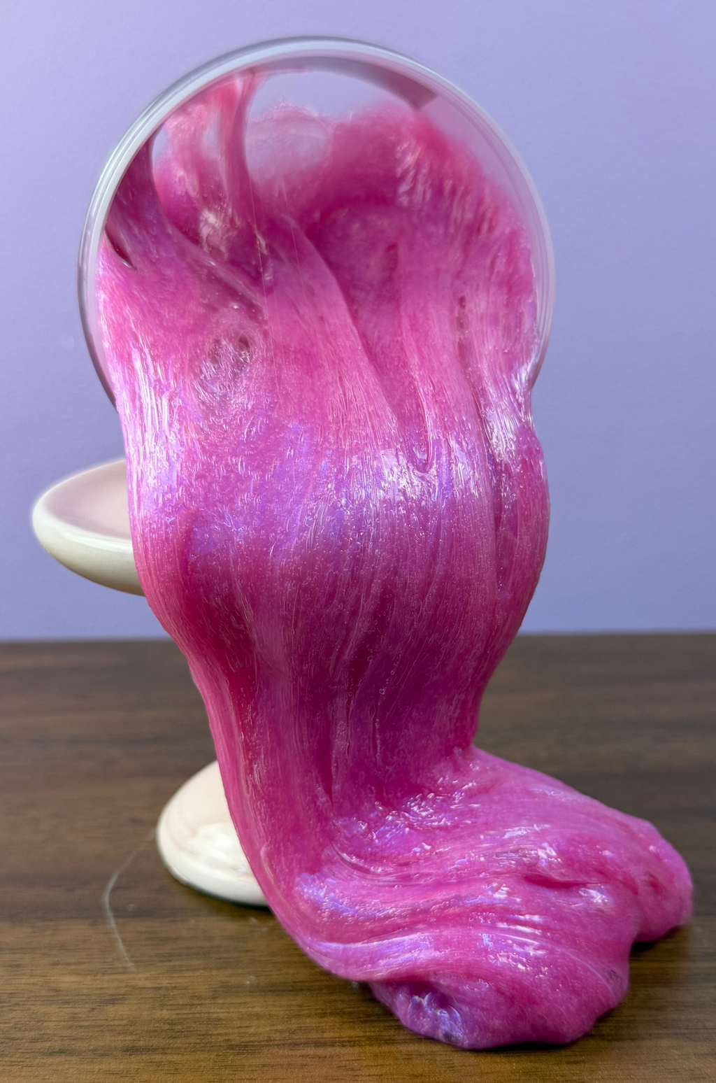 pink clear glue slime with purple shimmer texture