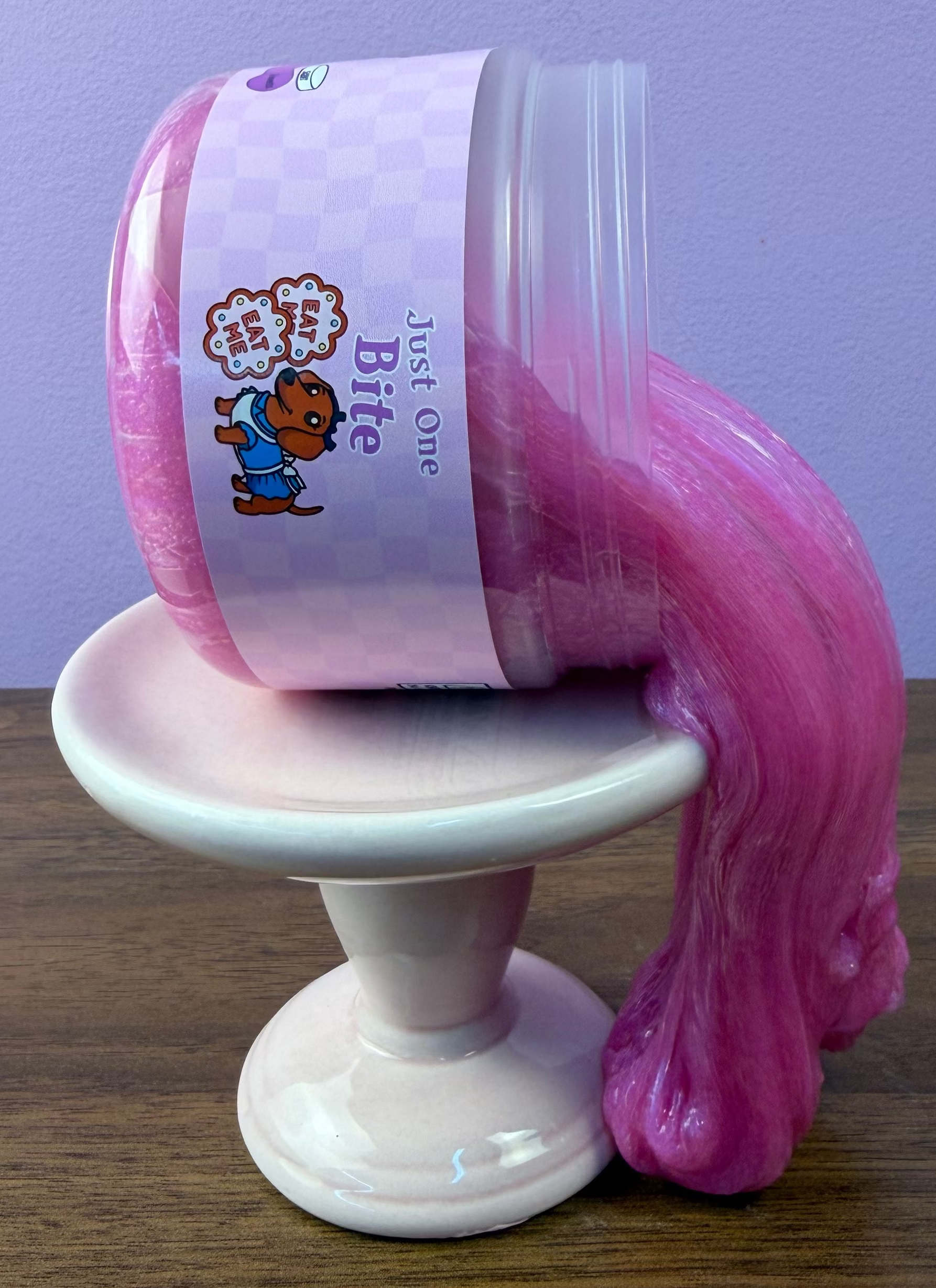 pink clear glue slime with purple shimmer texture