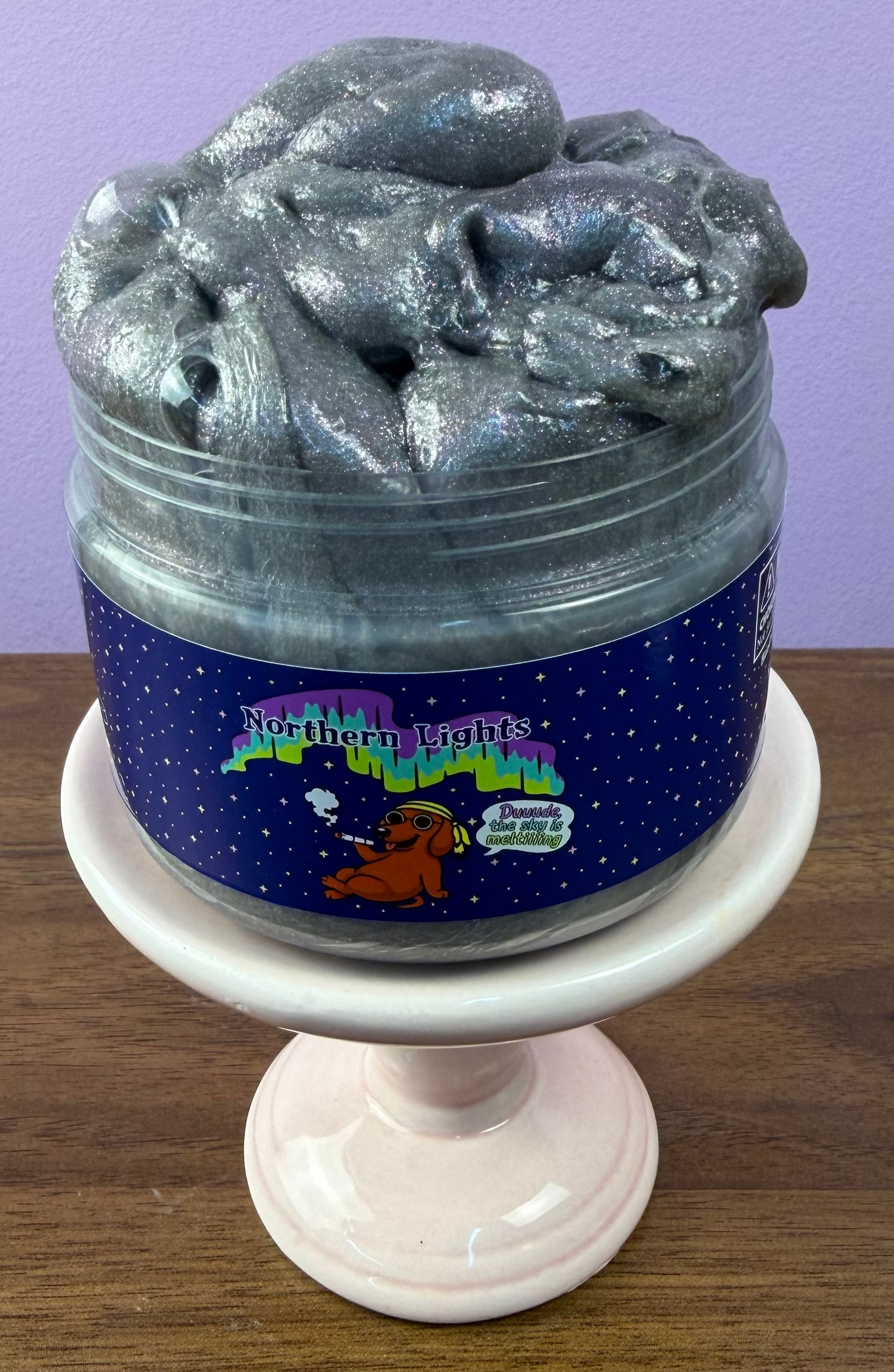 silver rainbow clear glue slime with a rainbow holographic shimmer texture