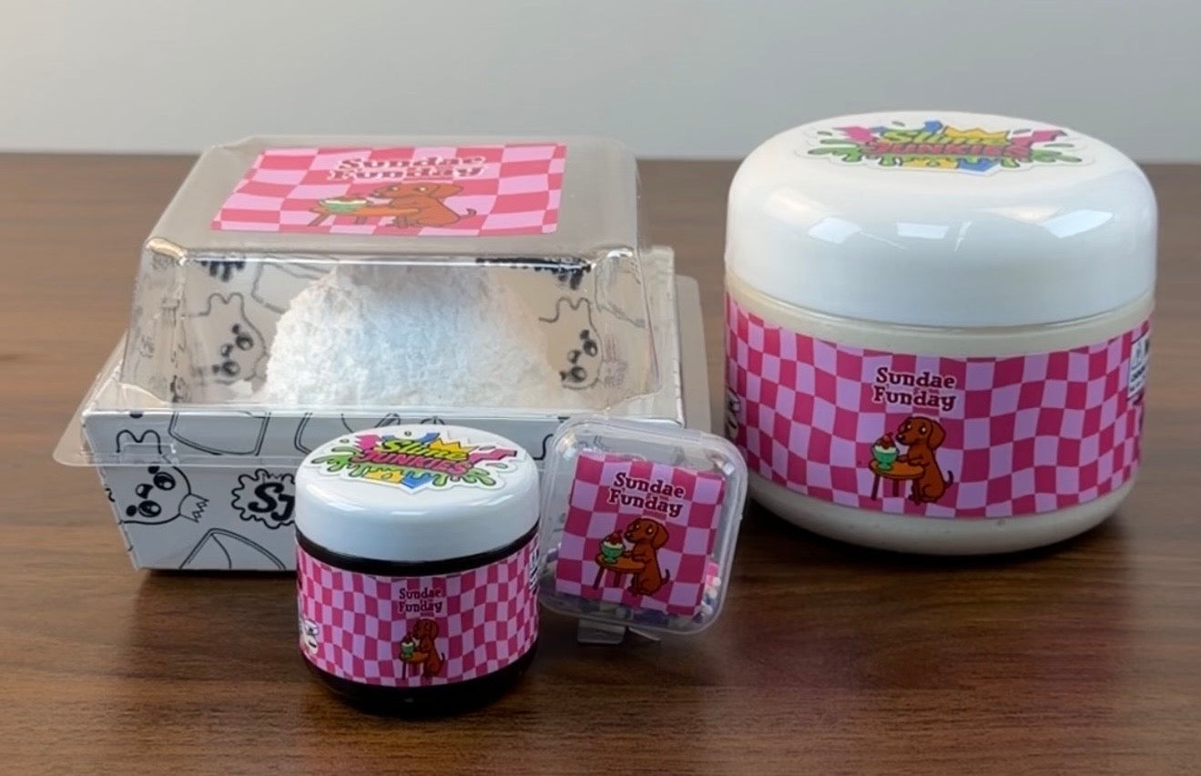 white thick n glossy slime with white clay topper with brown coated clear syrup topper with fake clay sprinkles