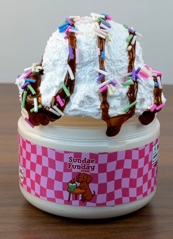 white thick n glossy slime with white clay topper with brown coated clear syrup topper with fake clay sprinkles